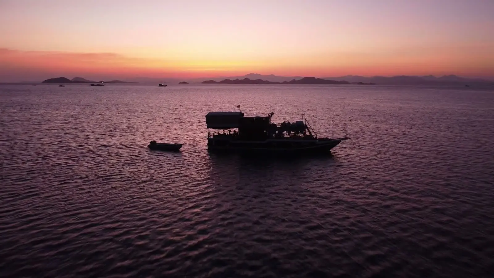 Komodo islands silhouetted on the horizon